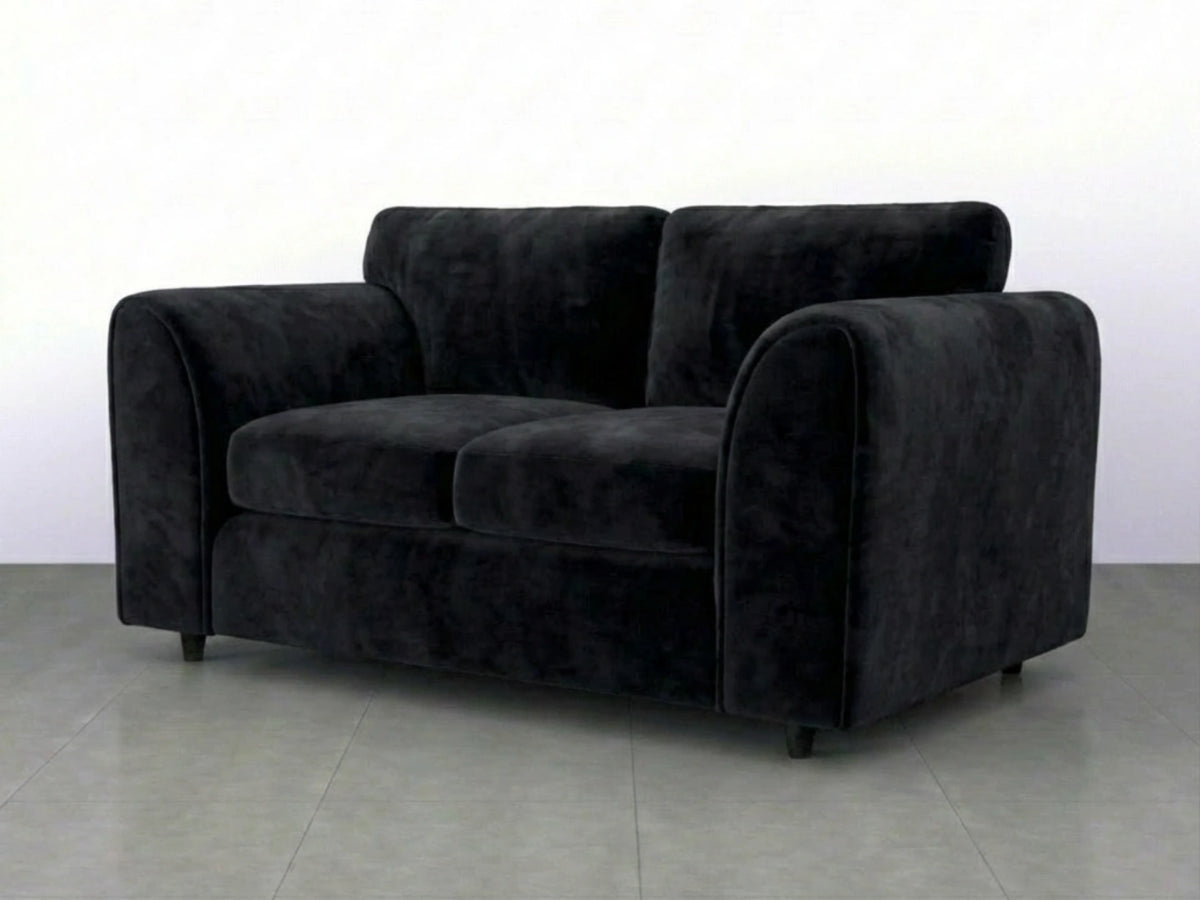 Black plush velvet fabric 2-seater sofa with full back from Gamzo Outlet, showcasing soft, luxurious upholstery and modern design.