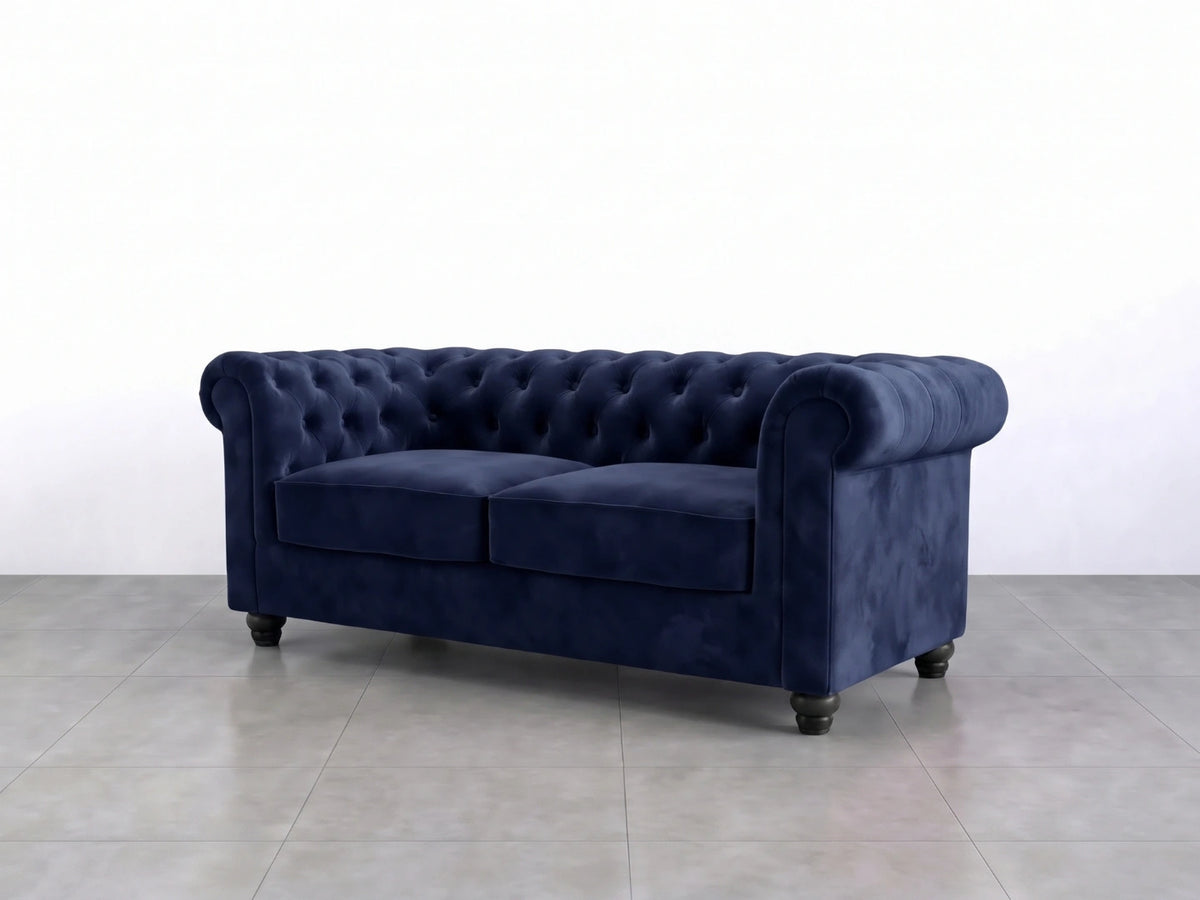Midnight blue Gamzo Outlet Chesterfield plush velvet sofa set, showing a stylish 2-seater sofa with tufted back and rolled arms.