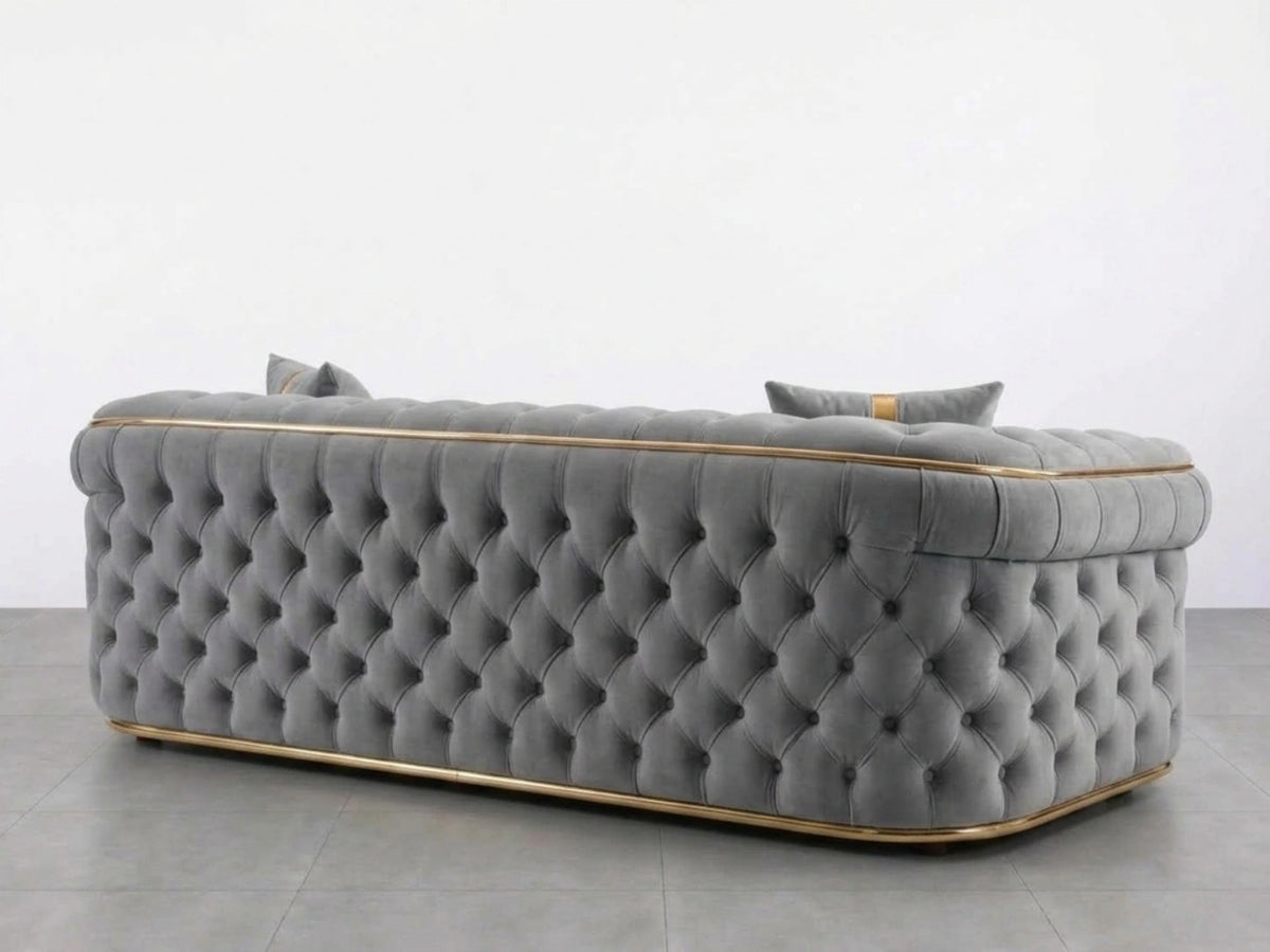 Light grey Gamzo Outlet Chesterfield sofa set with a stylish 2-seater design, featuring tufted upholstery and rolled arms.