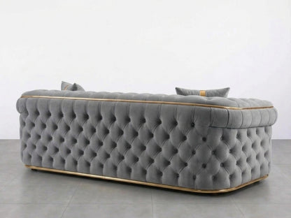 Light grey Gamzo Outlet Chesterfield sofa set with a stylish 2-seater design, featuring tufted upholstery and rolled arms.
