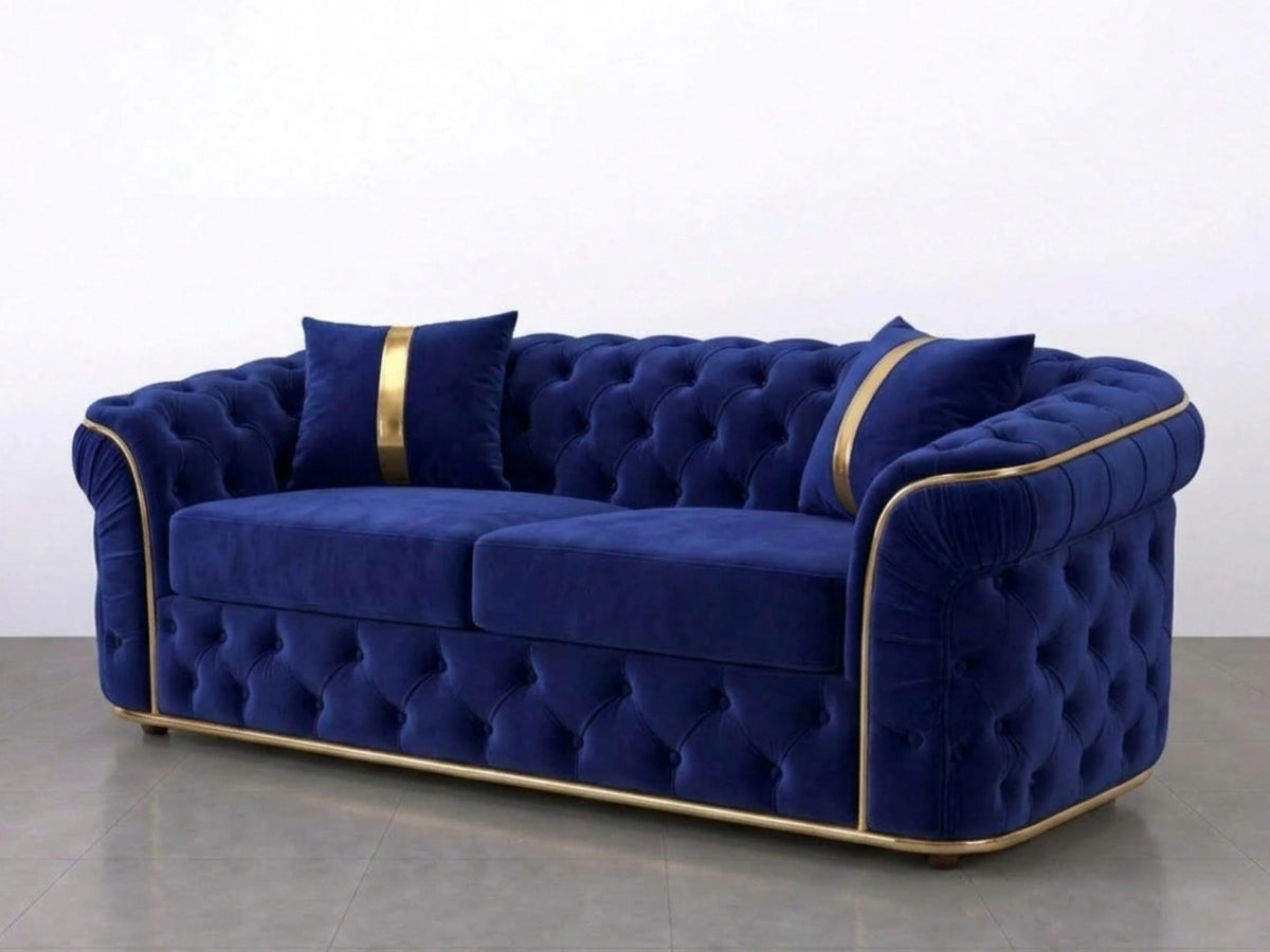 Midnight blue Gamzo Outlet Chesterfield sofa set with a stylish 2-seater design and tufted upholstery in a modern living room setting.