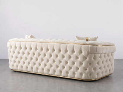 Cream Gamzo Outlet Chesterfield sofa set 2-seater with tufted cushions and rolled arms in a stylish living room setting.