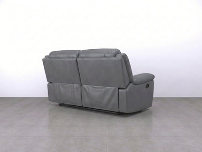 Gray Model R Recliner Sofa by Gamzo Outlet, two-seater with plush cushions and modern design, shown in a relaxed seated position.