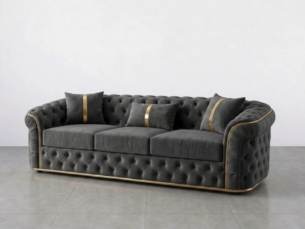 Dark grey Gamzo Outlet Chesterfield sofa set with two 2-seater sofas, showcasing tufted leather upholstery and classic design.