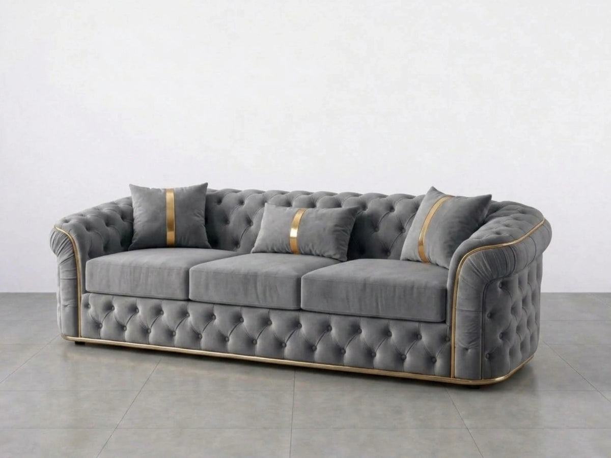 Light grey Gamzo Outlet Chesterfield sofa set with two 2-seater couches, elegant button-tufted design and classic rolled arms.
