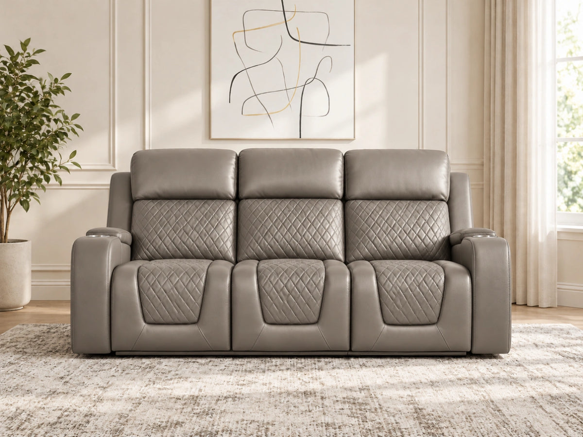 Grey Model B electric recliner sofa by Gamzo Outlet, three-seater with plush cushions and reclining features visible.