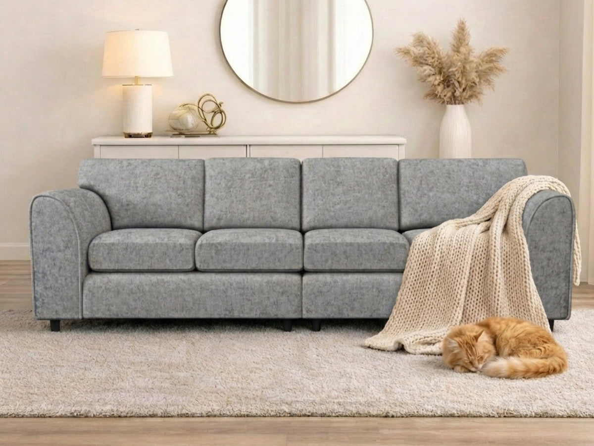 Light grey Gamzo Outlet Alaska Fabric 4 Seater Sofa with full back support, showcasing its spacious and comfortable design.
