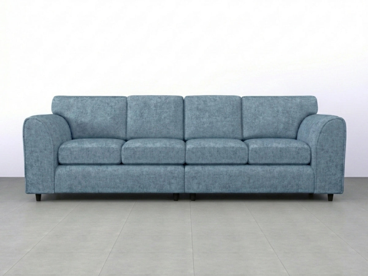Sky blue Alaska Fabric 4 Seater Sofa by Gamzo Outlet, featuring full back support and plush cushions in a modern living room setting.