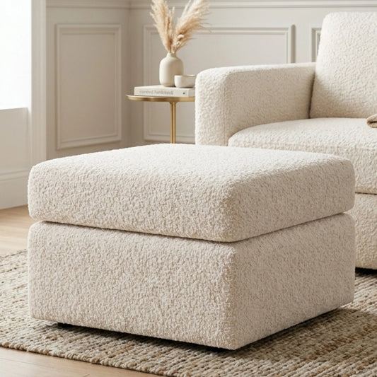 Gamzo Outlet boucle fabric footstool with a soft, textured surface and sturdy wooden legs for stylish comfort.
