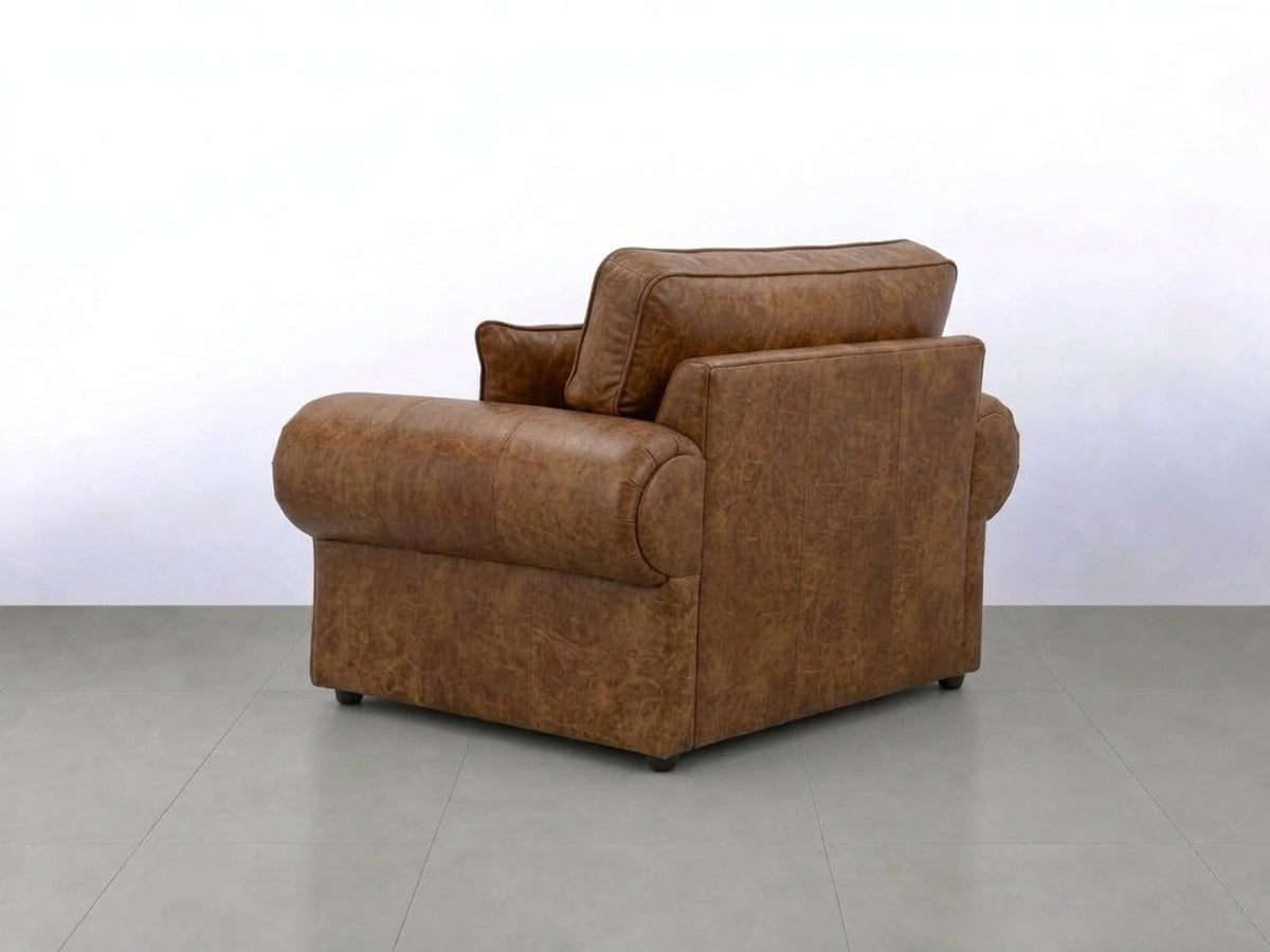 Brown leather armchair from the Wilcot full back sofa set by Gamzo Outlet, showcasing a plush, comfortable design with detailed stitching.