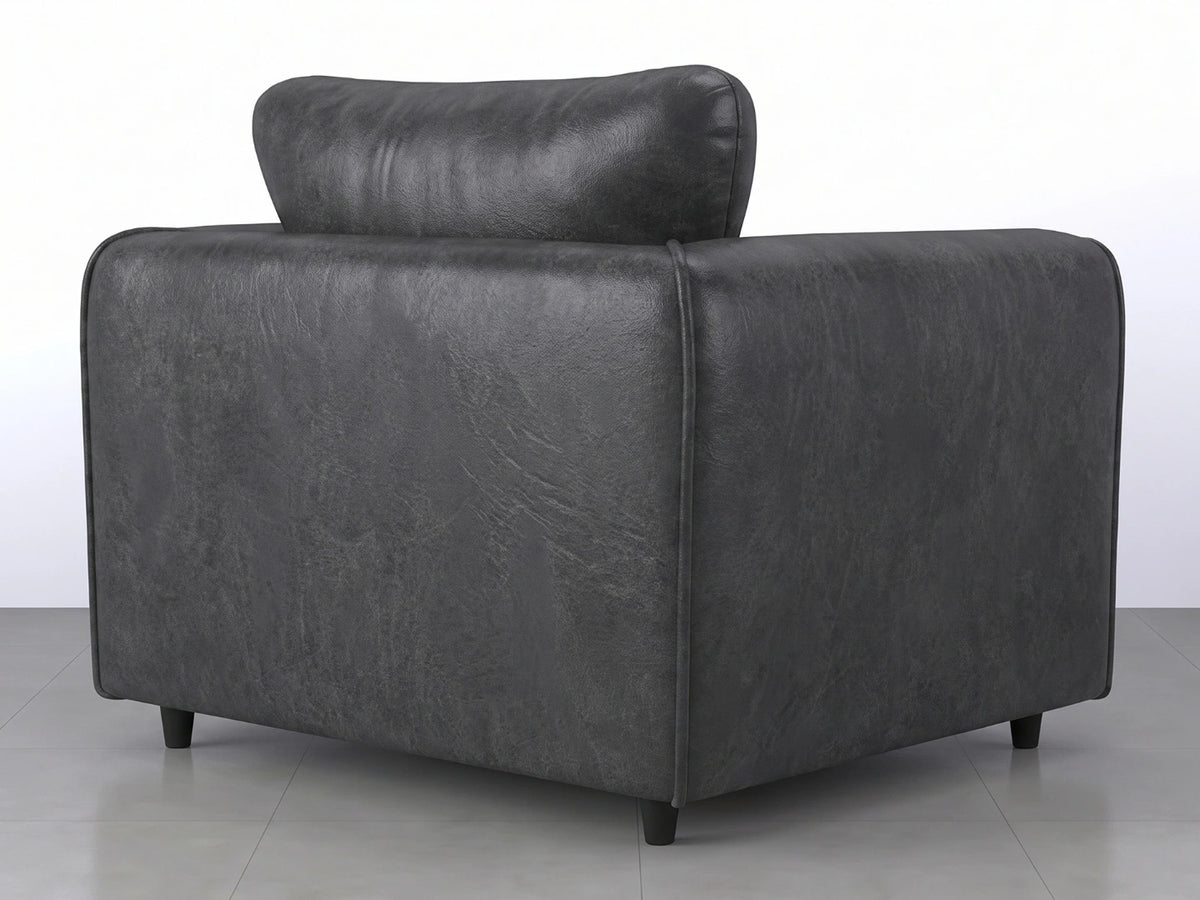 Black leather armchair from Gamzo Outlet's Dillon full back sofa set, showcasing a sleek, modern design with plush cushioning.