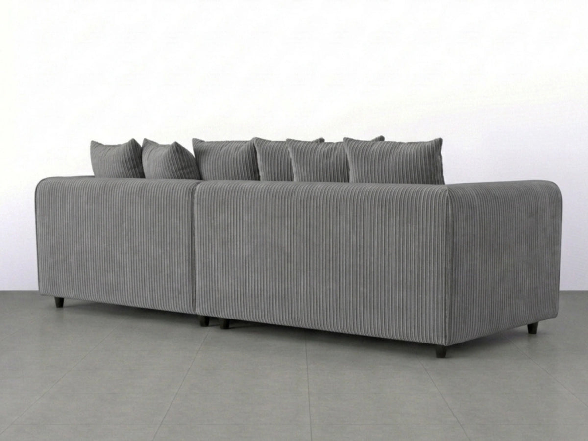 Charcoal grey Gamzo Outlet jumbo cord fabric 4-seater corner sofa with scatter back cushions and modern design.