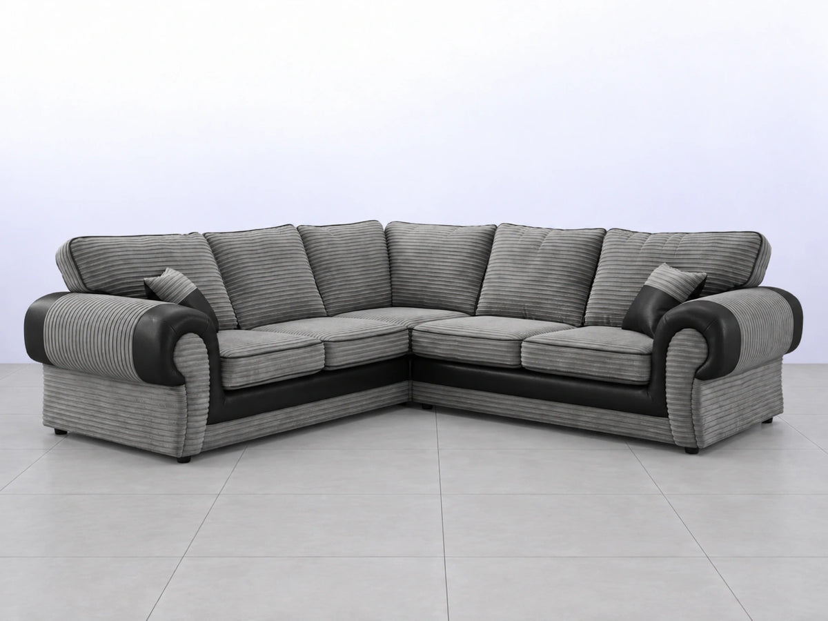 Black Tango full back corner sofa from Gamzo Outlet, showing plush cushions and sleek corner design in a modern living room setting.