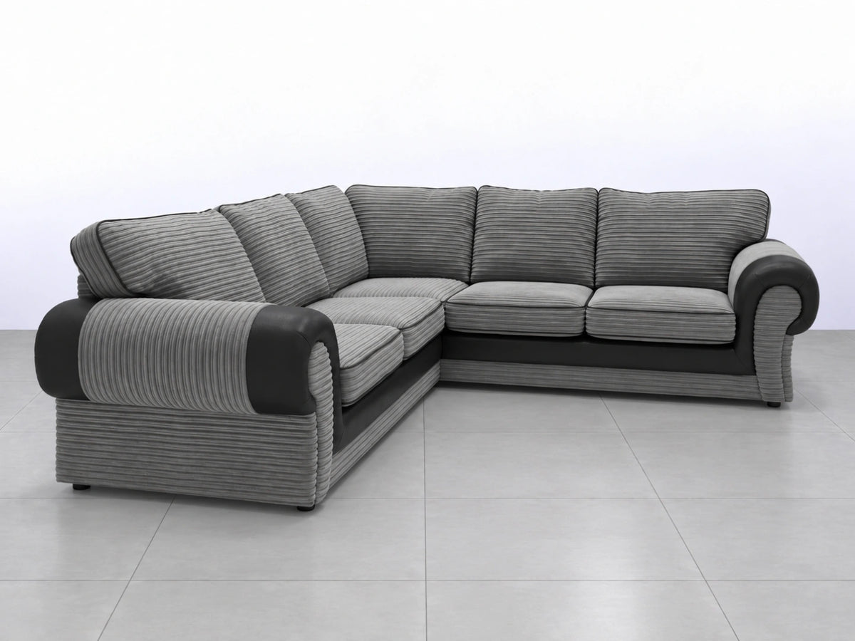 Black Tango full back corner sofa by Gamzo Outlet, showing its L-shaped design and comfortable cushioned seats.