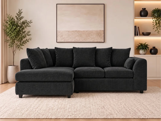 Black L-shaped sofa with jumbo cord fabric, scatter back cushions, and left-hand facing design by Gamzo Outlet.