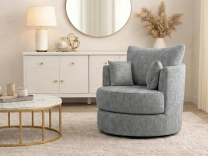 Light grey Gamzo Outlet Alaska Fabric Swivel Chair with a modern design and cushioned seat, shown from a side angle.