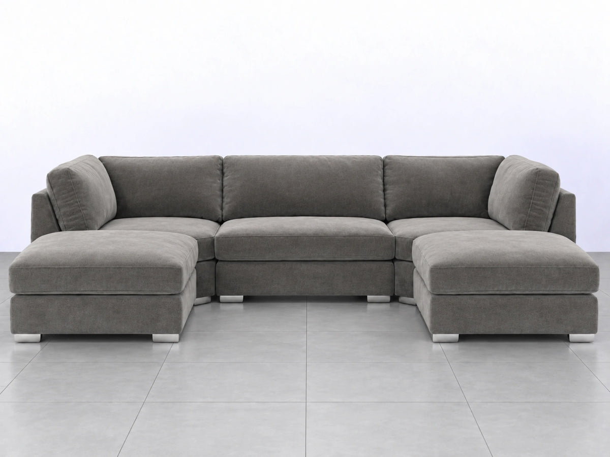 Light grey U-shaped furniture piece from Gamzo Outlet, showcasing its sleek, modern design and smooth surface.