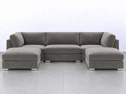 Light grey U-shaped furniture piece from Gamzo Outlet, showcasing its sleek, modern design and smooth surface.