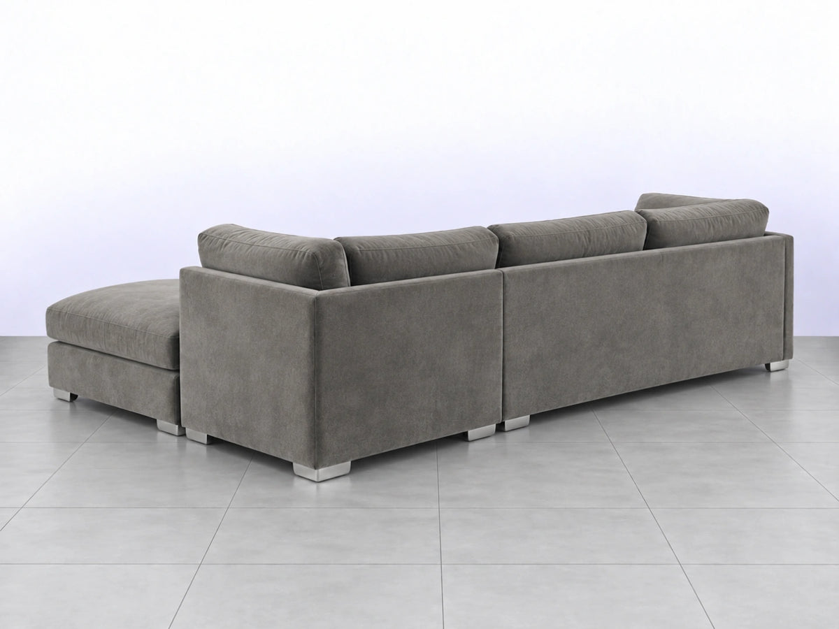 Light grey U-shaped furniture piece from Gamzo Outlet, showcasing its smooth curved design and modern style.