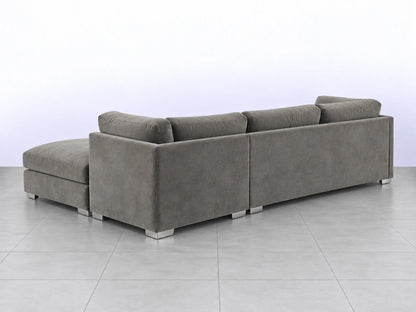 Light grey U-shaped furniture piece from Gamzo Outlet, showcasing its smooth curved design and modern style.