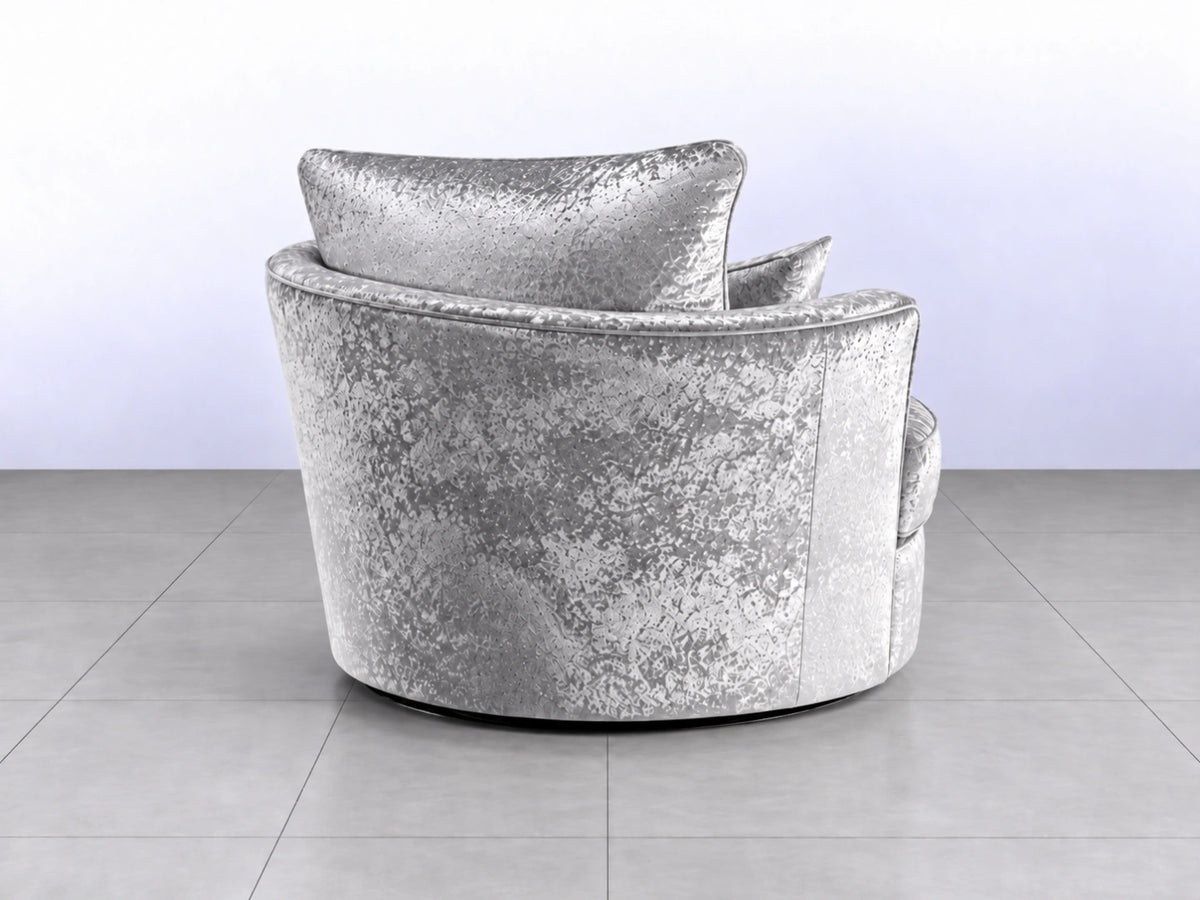 Silver crushed velvet swivel corner chair by Gamzo Outlet with plush upholstery and modern design.