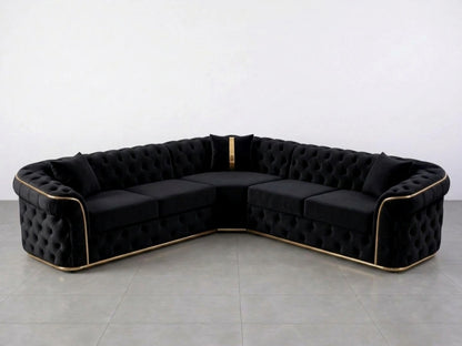 Black Chesterfield corner sofa by Gamzo Outlet, showcasing plush upholstery and classic tufted design in a modern living room setting.