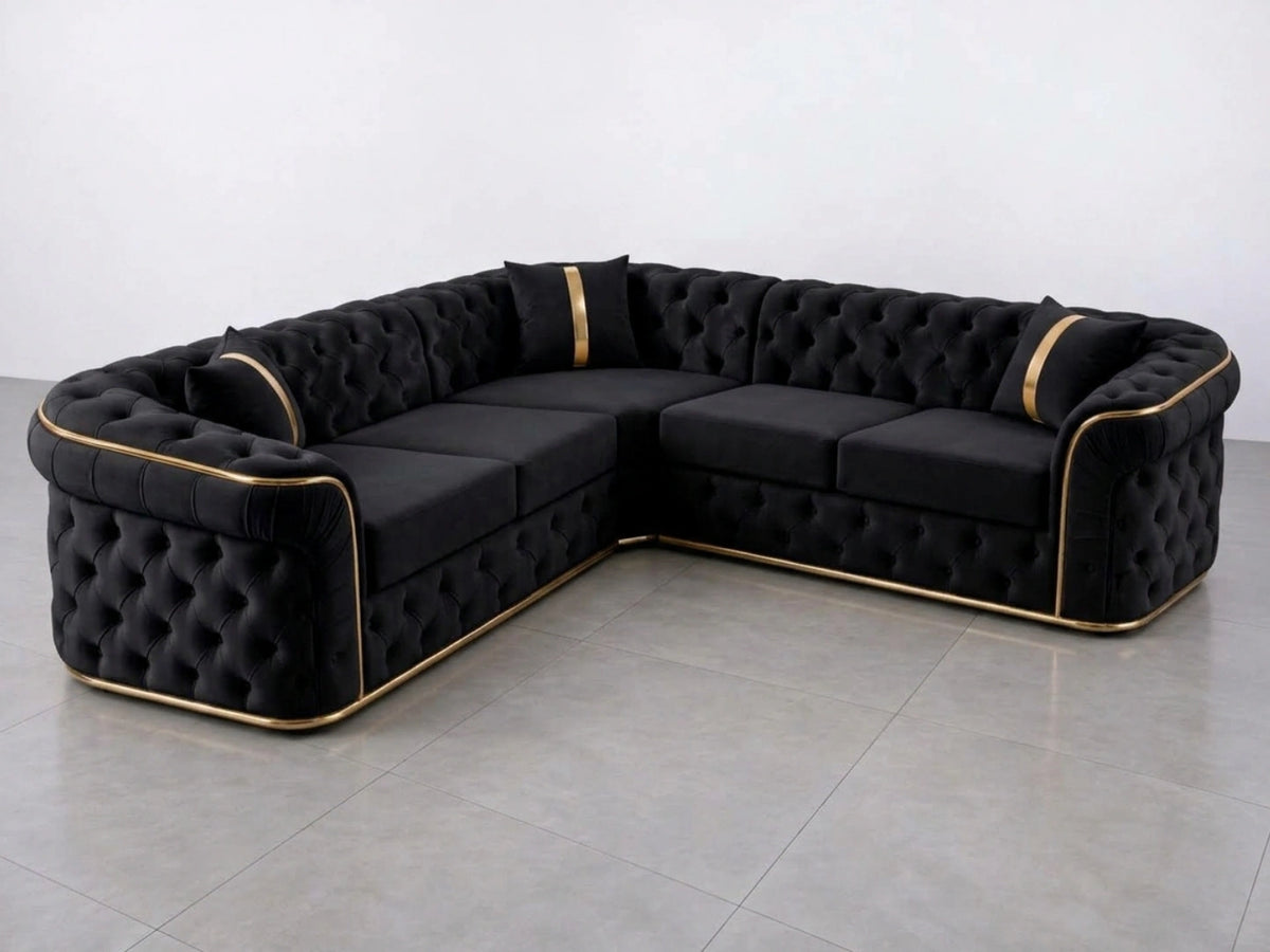 Black Chesterfield corner sofa by Gamzo Outlet, showcasing plush upholstery and classic tufted design in a spacious living room setting.