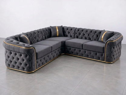 Dark grey Chesterfield corner sofa by Gamzo Outlet with tufted upholstery and plush cushions, ideal for modern living rooms.