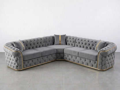 Light grey Chesterfield corner sofa by Gamzo Outlet with tufted upholstery and plush cushions in a modern living room setting.