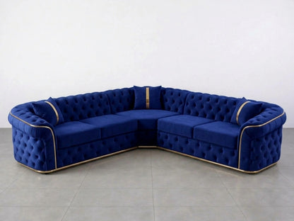 Midnight blue Chesterfield corner sofa by Gamzo Outlet with tufted upholstery and plush cushions in a modern living room setting.