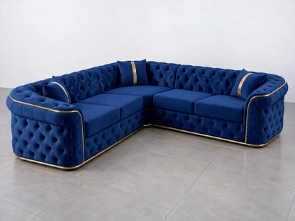 Midnight blue Chesterfield corner sofa by Gamzo Outlet with tufted upholstery and plush cushions in a stylish living room setting.