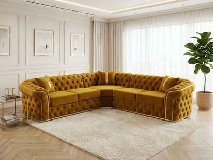 Gamzo Outlet Chesterfield corner sofa in mustard upholstery, showcasing plush cushions and elegant armrest design.