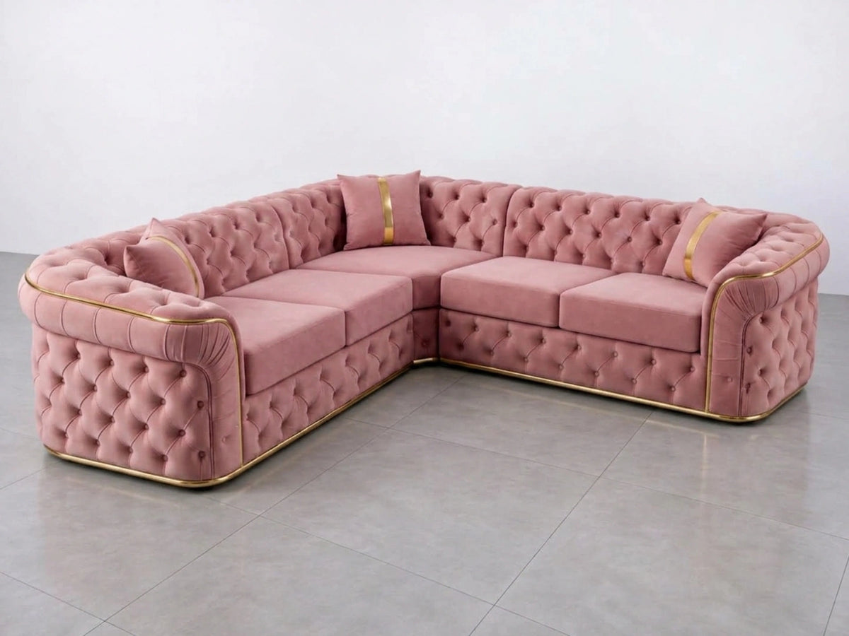 Pink Chesterfield corner sofa by Gamzo Outlet, featuring tufted upholstery and plush cushions in a stylish L-shaped design.