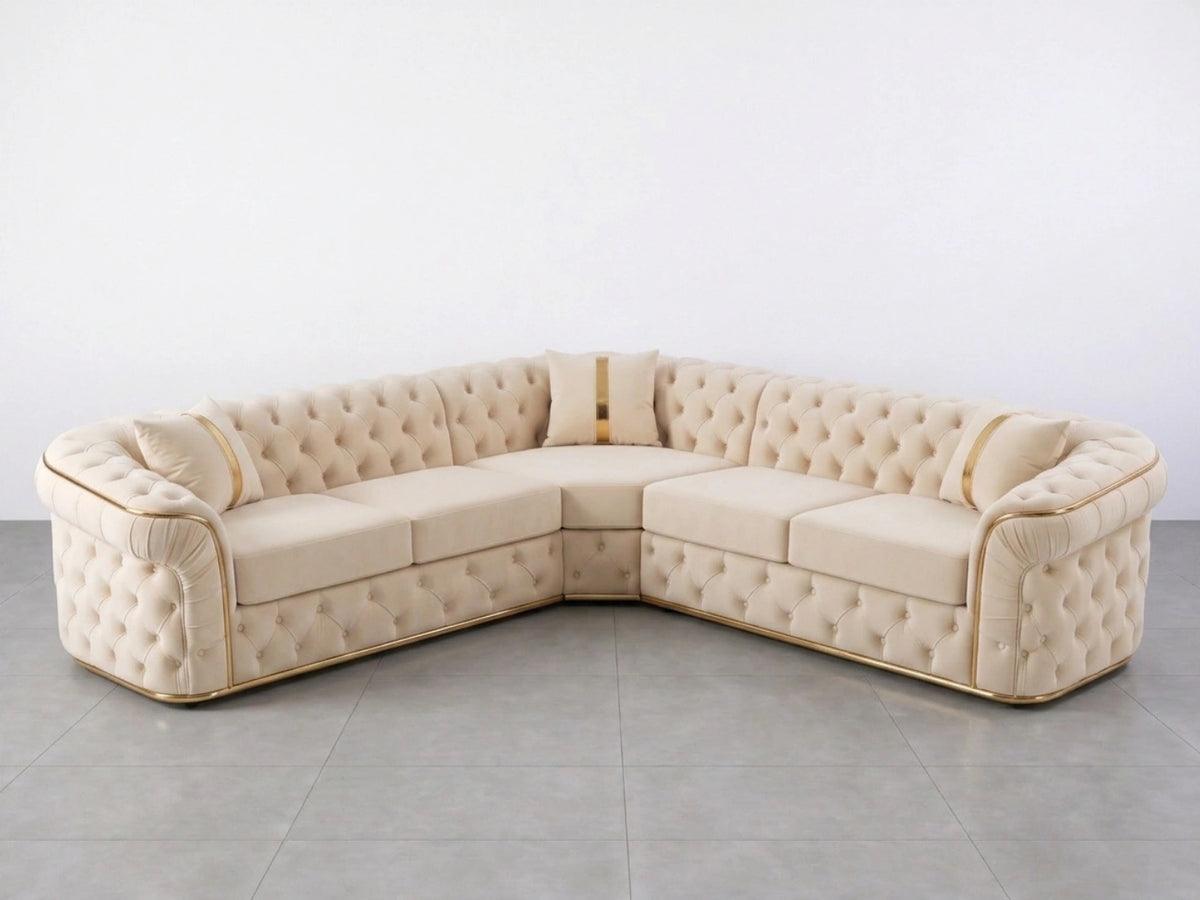 Cream Chesterfield corner sofa by Gamzo Outlet with tufted upholstery and wooden legs, shown in a cozy living room setting.