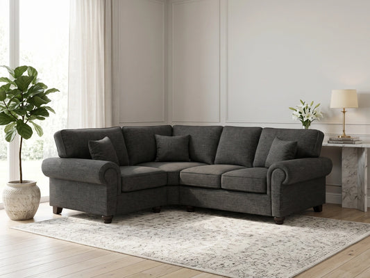 Grey Wilcot fabric L-shaped sofa by Gamzo Outlet, shown from the left side with plush cushions and modern design.