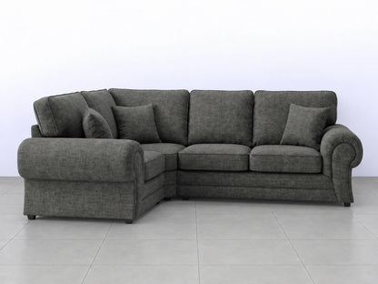 Grey Wilcot fabric L-shaped sofa by Gamzo Outlet, showing the left-hand corner and plush seating in a modern living room setting.