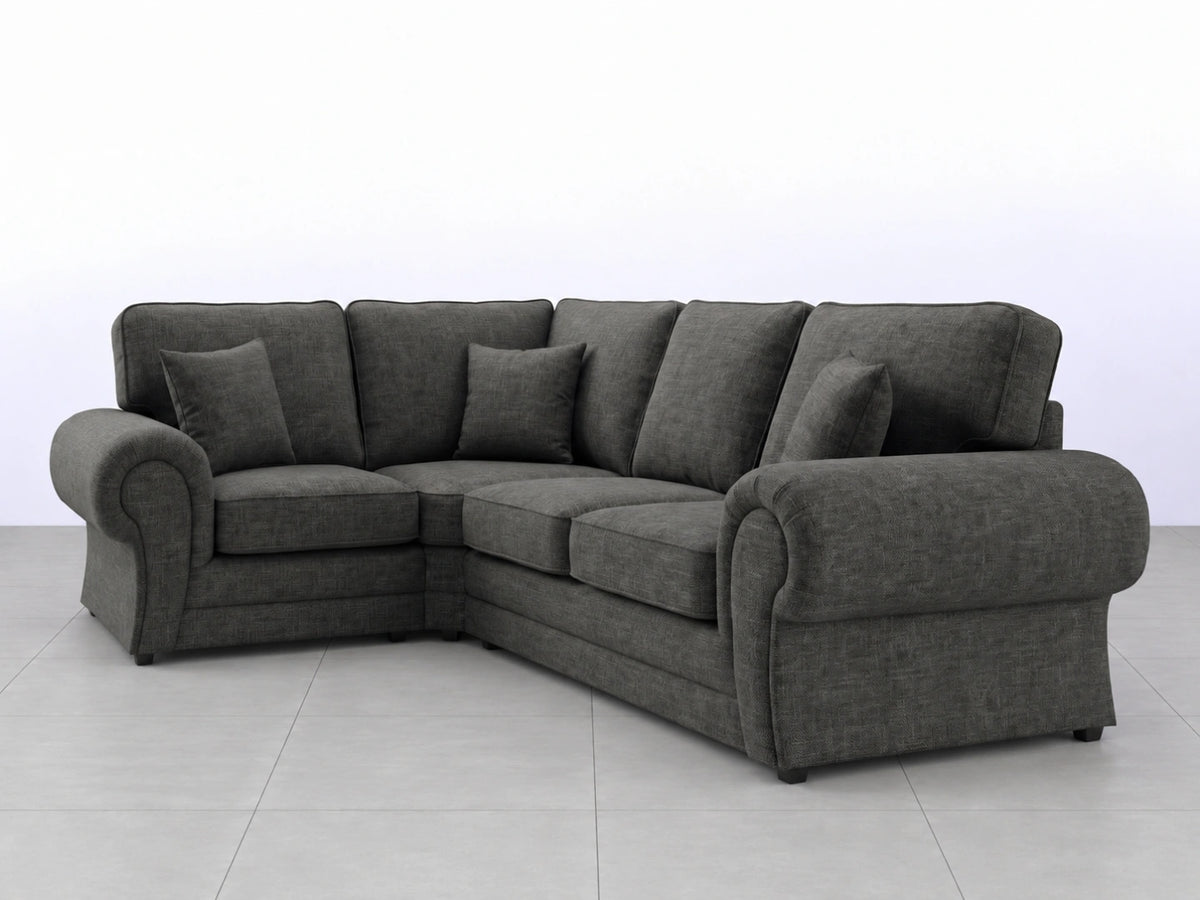Grey Wilcot fabric L-shape sofa by Gamzo Outlet, shown from the left side with plush cushions and modern design.